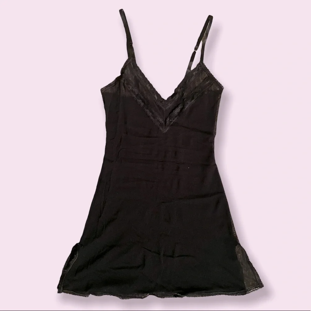 Sheer black negligeé with lace trim